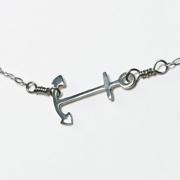 Silver Anchor Pendant, part of a collection of fun and playful nautical jewelry by Tinker Company, inspired by your favorite travel and vacation memories of summer days on the water.