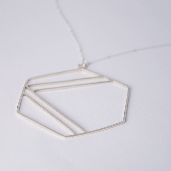Side view of the Hexagon Necklace in sterling silver