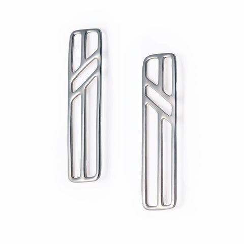 Telephone Pole Earrings in sterling silver by Tinker Company. Part of a collection of abstract geometric jewelry celebrating the everyday things that connect you to your loved ones even when you're far apart. Great gift for long distance friendships and relationships.
