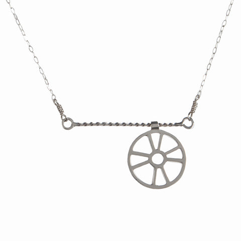 The Moving Life Preserver on a Rope Necklace has a ring buoy charm that moves across a twisted wire rope bar necklace. A great gift for the "lifesaver" in your life, from a collection of kinetic jewelry and playful nautical necklaces.
