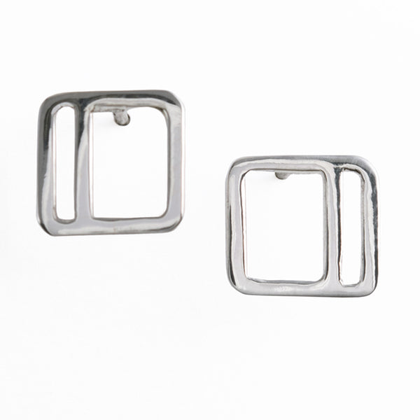 Silver square stud earrings with a stripe have a comfortable design great for everyday wear. From a collection of minimalist style geometric jewelry by Tinker Company, a great addition to your capsule wardrobe.