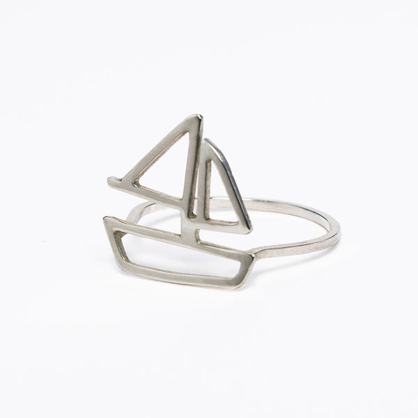Sterling silver sailboat ring from a collection of modern and minimal nautical jewelry designed to feed your yachting wanderlust and capture your favorite summer sailing memories. Made by Tinker Company in New York City.