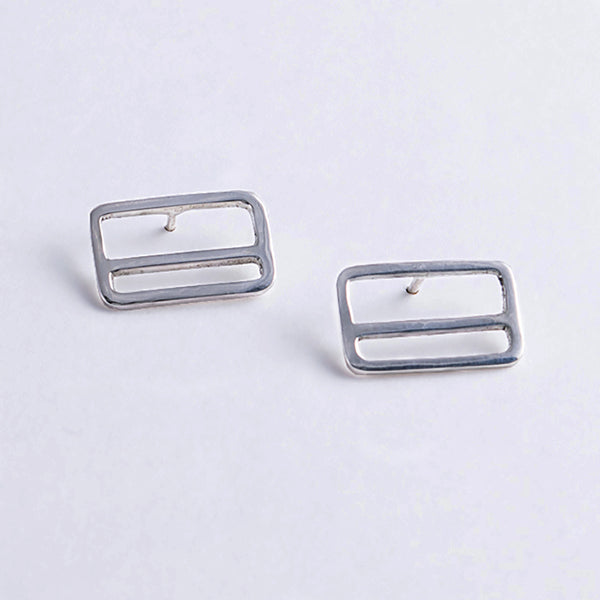 Silver rectangle earrings with a horizontal stripe, design inspired by the NYC Metrocard.