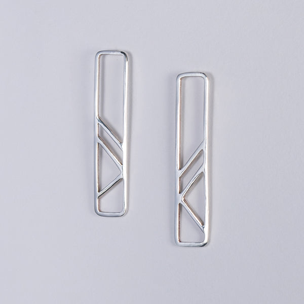 Pillar Earrings in sterling silver. This jewelry design was inspired by the clean lines of geometric architectural support systems.
