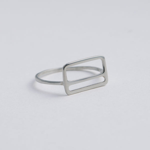 Side view of the Metrocard Ring in sterling silver. A sleek and simple design, this ring is an abstract representation of the NYC subway metrocard.